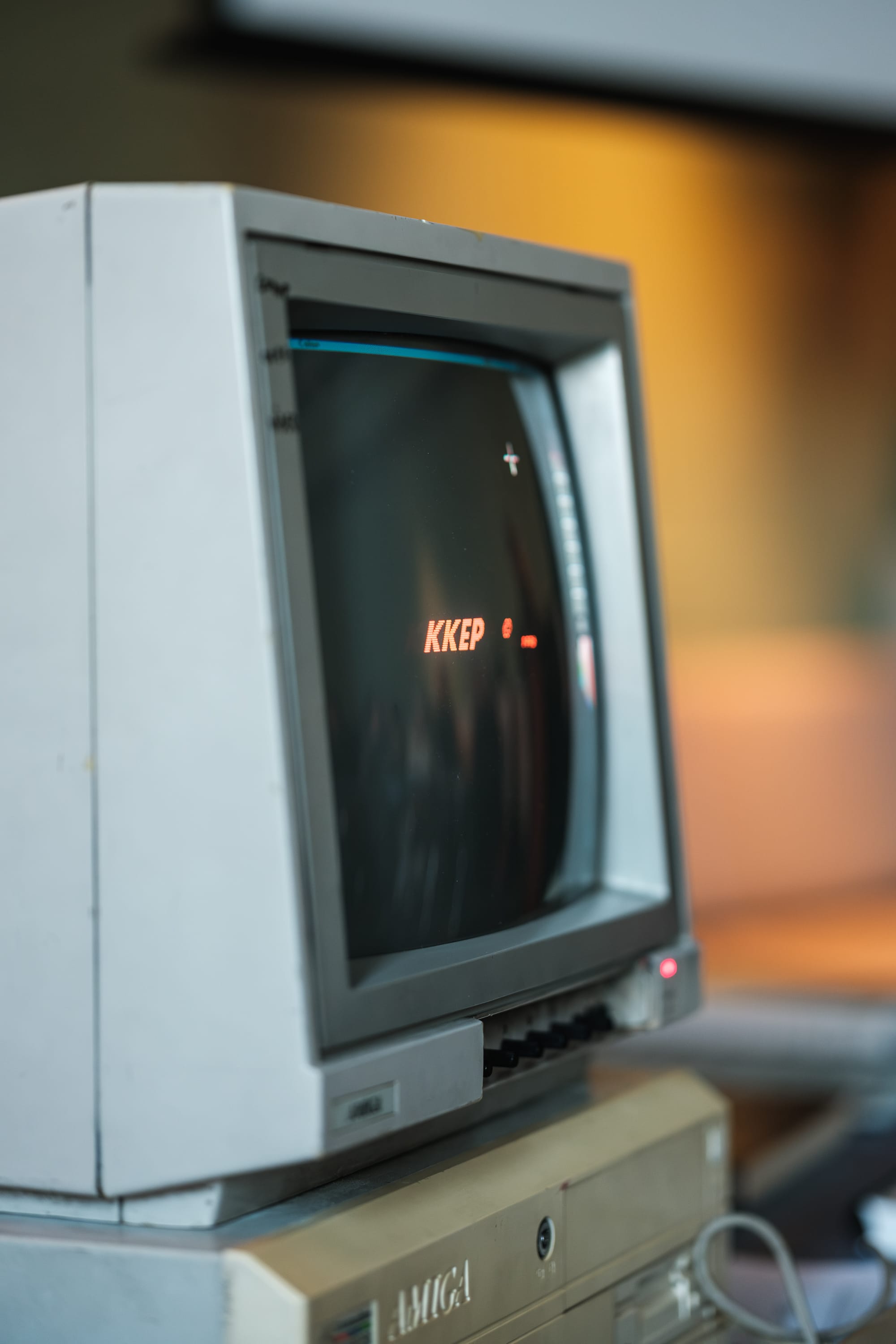 Close view of an Amiga computer monitor with the letters KKEP on screen.